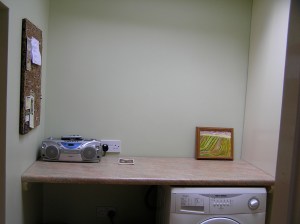 Laundry room:  counter and clothes washing machine